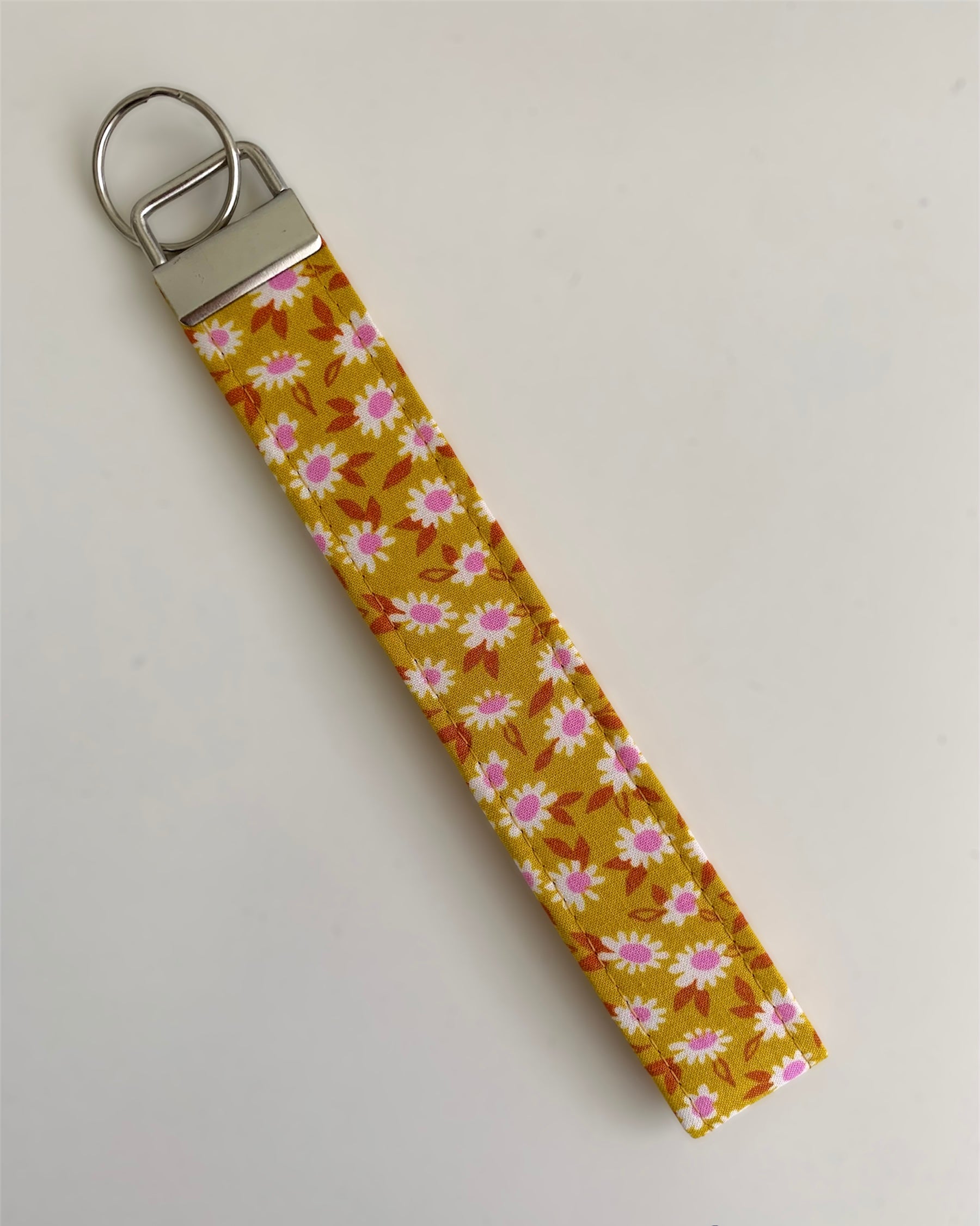 Mustard Petite Floral Wristlet Key Chain – Isobel Lane
