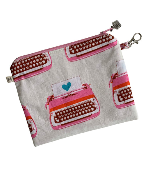 Typewriter White And Pink Zipper Pouch